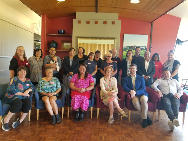 An image of the 2018 Whakakotahi cohort. They are in two rows - the first row is seated and the second row is standing behind the chairs. 