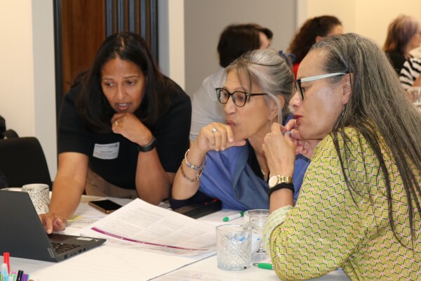 Women using laptop at workshop 