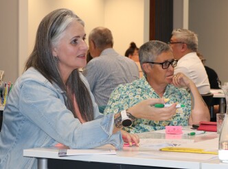 Women speaking at a workshop